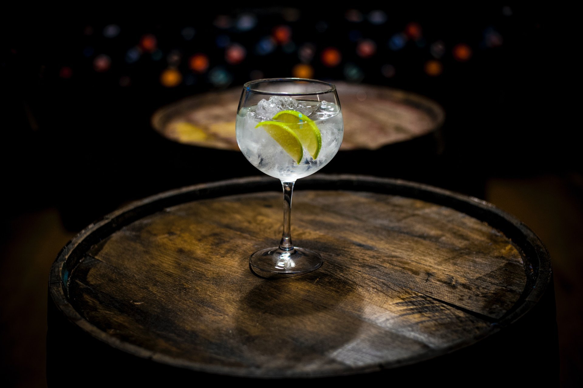 gin glass on bar barrel 